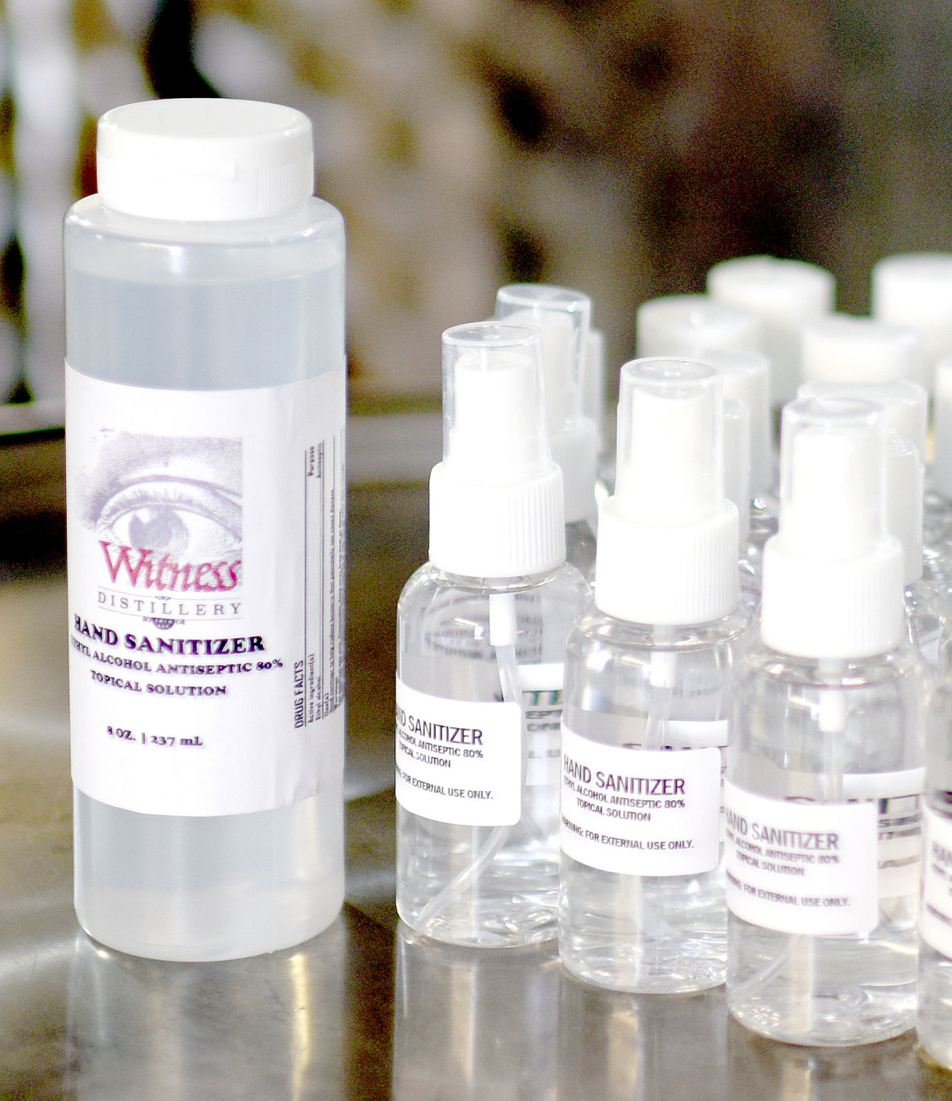 Whiskey to hand sanatizer bottles